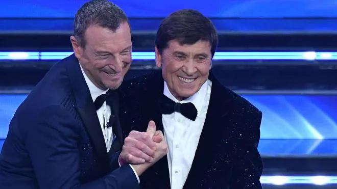 Sanremo Festival host and artistic director, Amadeus (L) and Italian singer Gianni Morandi (R) on stage at the Ariston theatre during the 72nd Sanremo Italian Song Festival, in Sanremo, Italy, 05 February 2022. The music festival runs from 01 to 05 February 2022.   ANSA/ETTORE FERRARI