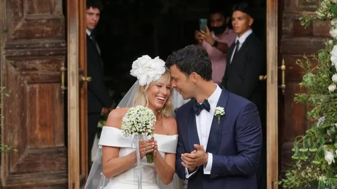 Italian retired swimmer Federica Pellegrini outside the church of San Zaccaria after the celebration of the marriage with her coach Matteo Giunta, in Venice, Italy, 27 August 2022.
ANSA/ANDREA MEROLA