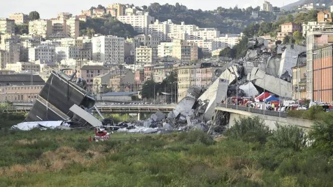 A large section of the Morandi viaduct upon which the A10 motorway runs collapsed in Genoa, Italy, 14 August 2018. Both sides of the highway fell. Around 10 vehicles are involved in the collapse, rescue sources said Tuesday. The viaduct gave way amid torrential rain. The viaduct runs over shopping centres, factories, some homes, the Genoa-Milan railway line and the Polcevera river. ANSA/FLAVIO LO SCALZO