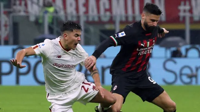 Roma�s Pauolo Dybala (L) challenges for the ball  AC Milan's Olivier Giroud  during the Italian serie A soccer match between AC Milan and As Roma at Giuseppe Meazza stadium in Milan, 8 January 2022.
ANSA / MATTEO BAZZI