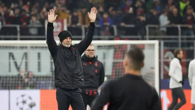 AC Milan's coach Stefano Pioli greets his supporters before the 1st leg of the UEFA Champions League round of 16 soccer match between AC Milan and Tottenham Hotspurs at Giuseppe Meazza Stadium in Milan, Italy, 14 Februray 2023. ANSA / ROBERTO BREGANI