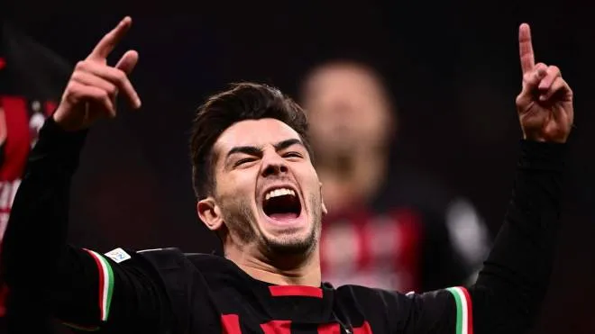 AC Milan's Spanish midfielder Brahim Diaz celebrates after opening the scoring during the UEFA Champions League round of 16, first leg football match between AC Milan and Tottenham Hotspur on February 14, 2023 at the San Siro stadium in Milan. (Photo by Marco BERTORELLO / AFP)